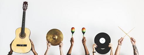 Hands holding music instruments Hands holding music instruments